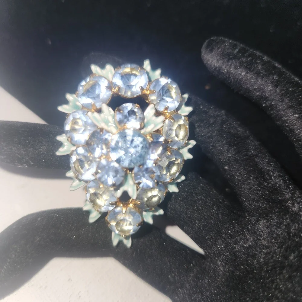 Vintage Light Blue Rhinestone Floral Cluster brooch Gold Tone Enamel Leaf Detail